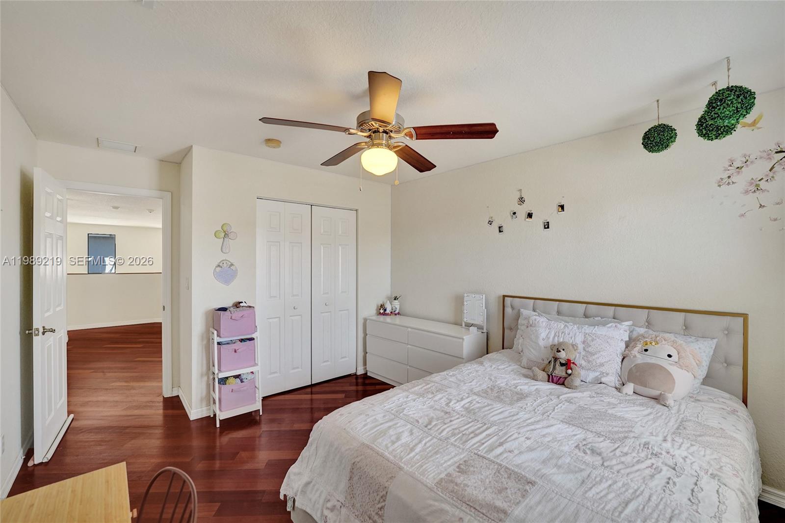 3936 Cascade Terrace Weston, FL 33332 - Photo 57 of 90 a bedroom with a bed and a chandelier