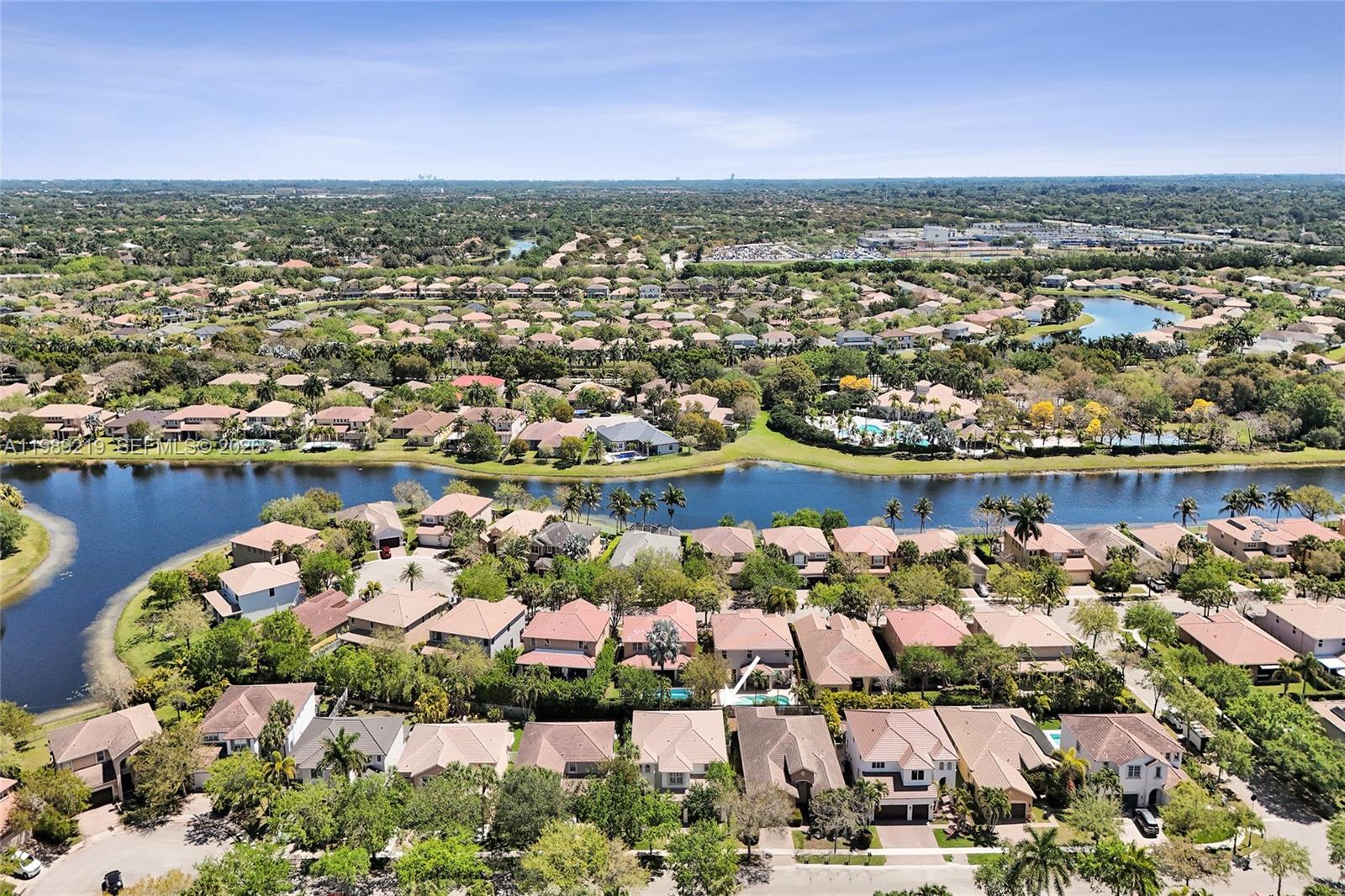 3936 Cascade Terrace Weston, FL 33332 - Photo 6 of 90 an aerial view of residential houses with outdoor space