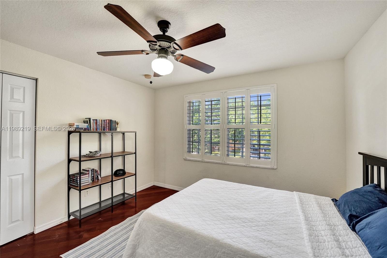 3936 Cascade Terrace Weston, FL 33332 - Photo 65 of 90 a bedroom with a large bed and a window