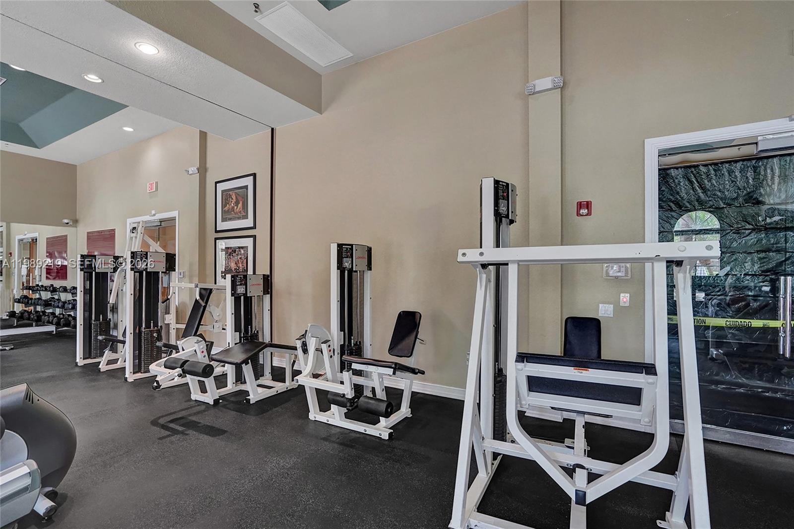 3936 Cascade Terrace Weston, FL 33332 - Photo 82 of 90 a view of a room with gym equipment