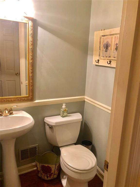 143 Boxfield Road Pittsburgh, PA 15241 - Photo 13 of 25 neutral half bath w chair rail and white pedestal sink