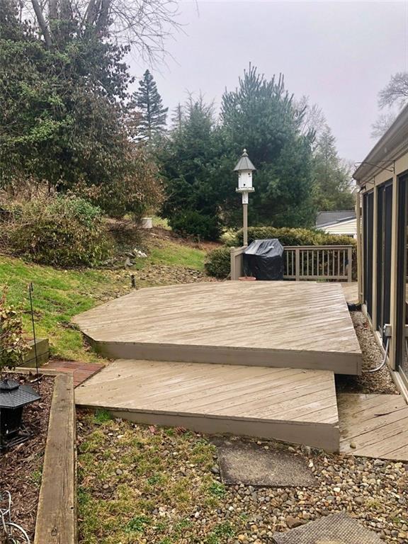143 Boxfield Road Pittsburgh, PA 15241 - Photo 23 of 25 one of the outside decks, perfect for catching some rays, or hosting a get together(birdhouse does NOT convey)