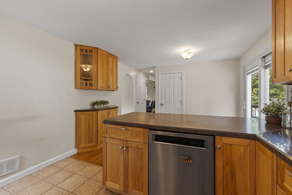 6 Edith Road Hudson, MA 01749 - Photo 8 of 30 a kitchen with stainless steel appliances a sink and a cabinets