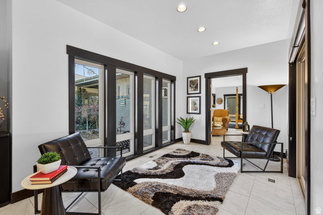 145 Carnesecca Court Mapleton, UT 84664 - Photo 44 of 109 Sitting room with baseboards and recessed lighting