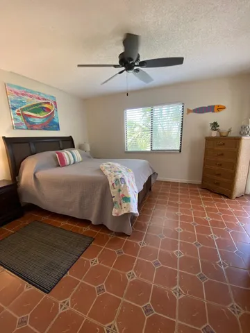 a bathroom with a sink vanity and mirror