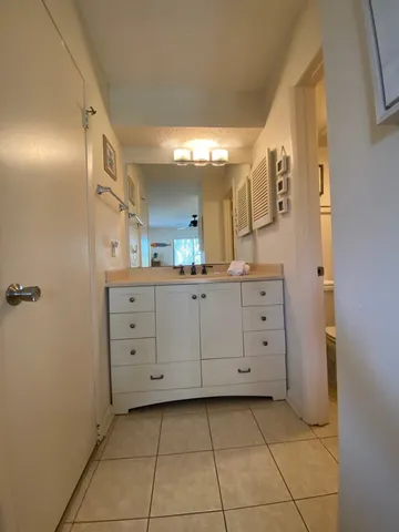 a bedroom with bed and window