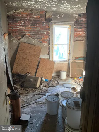 a room with water heater and window