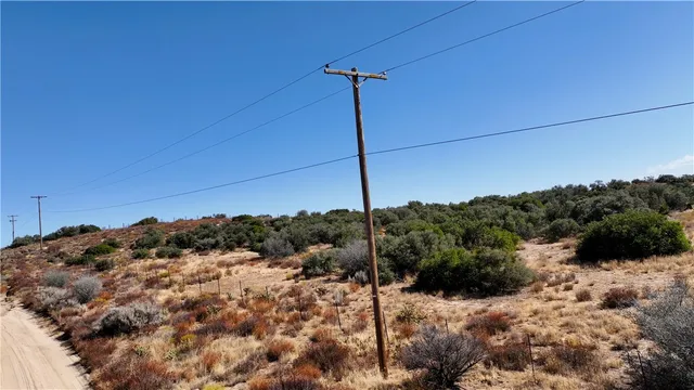 a view of a house with a mountain
