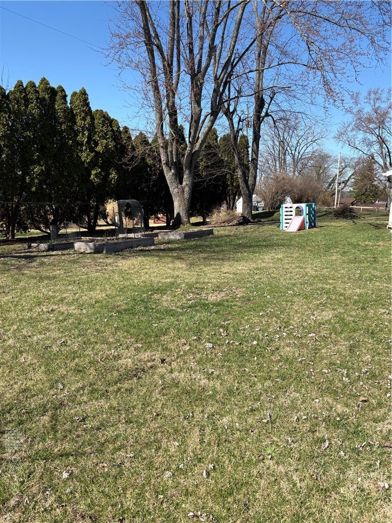 1513 Ridgeway Drive Springfield, OH 45506 - Photo 51 of 53 This spacious yard offers ample room for outdoor recreation and includes mature trees.