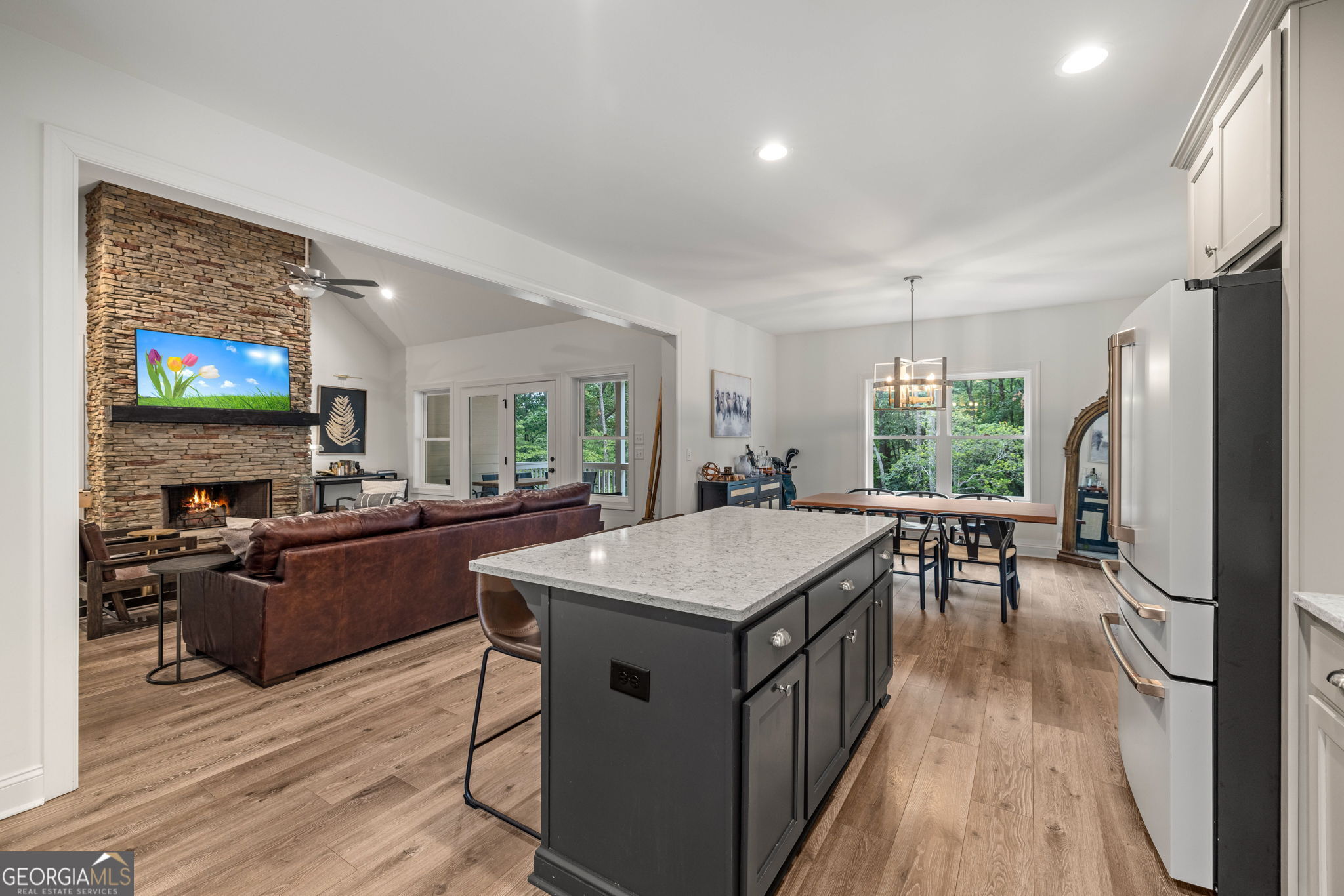 373 McIntosh Road Clarkesville, GA 30523 - Photo 12 of 92 a kitchen with sink stove and refrigerator