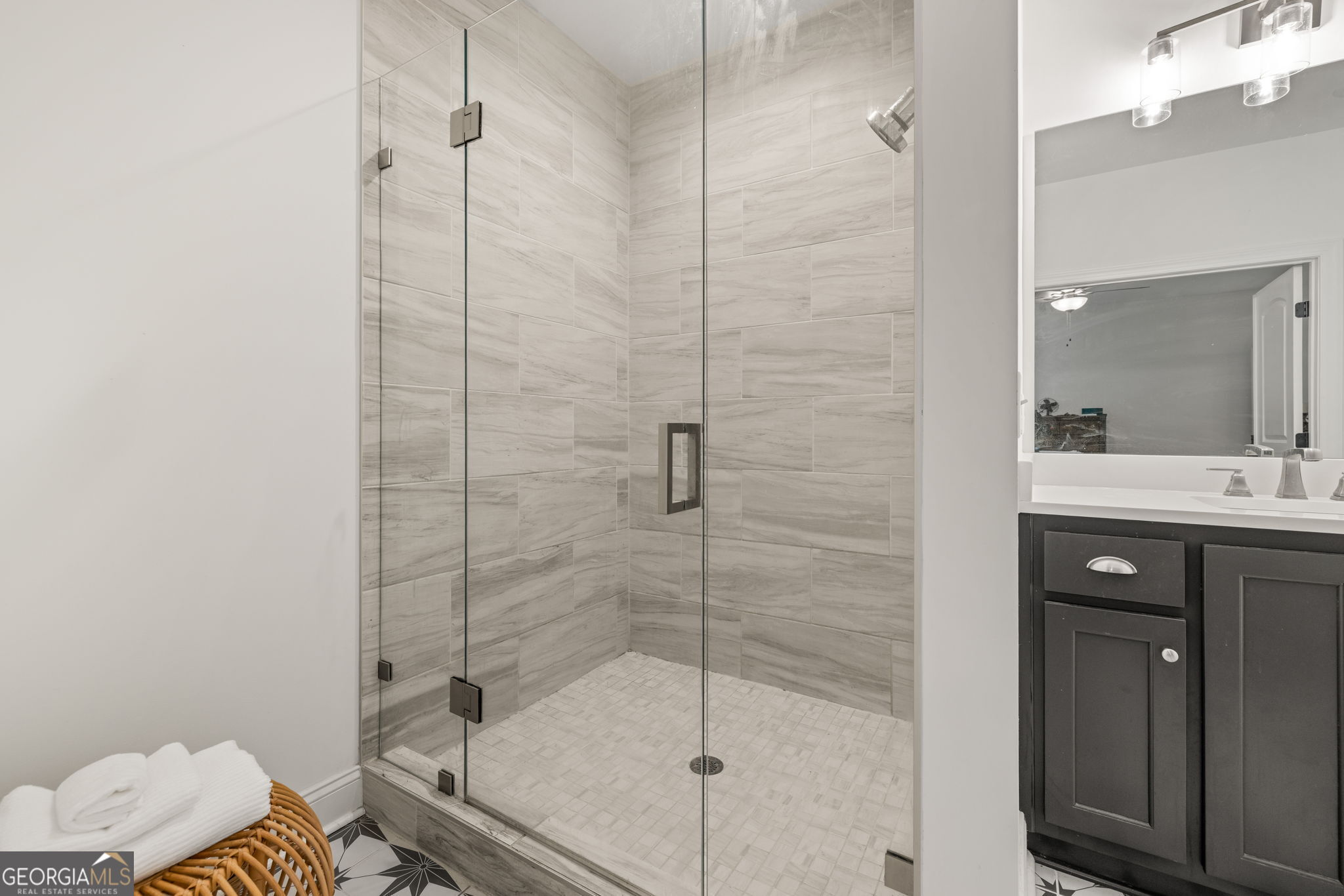 373 McIntosh Road Clarkesville, GA 30523 - Photo 18 of 92 a bathroom with a shower toilet and sink