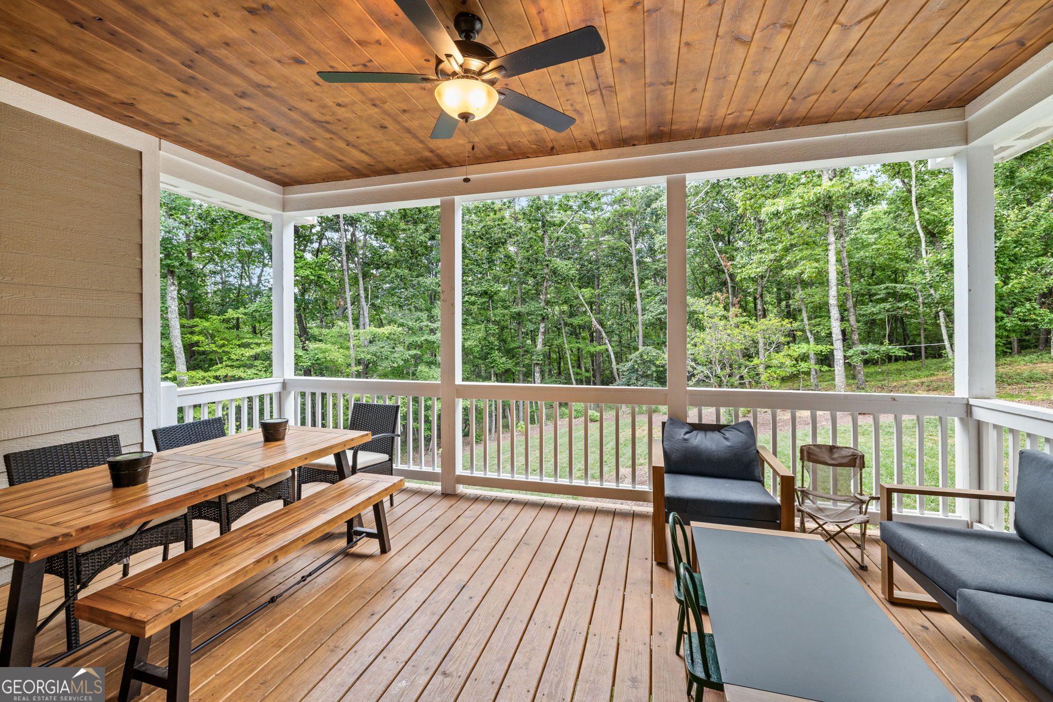 373 McIntosh Road Clarkesville, GA 30523 - Photo 27 of 92 a living room with furniture and a large window