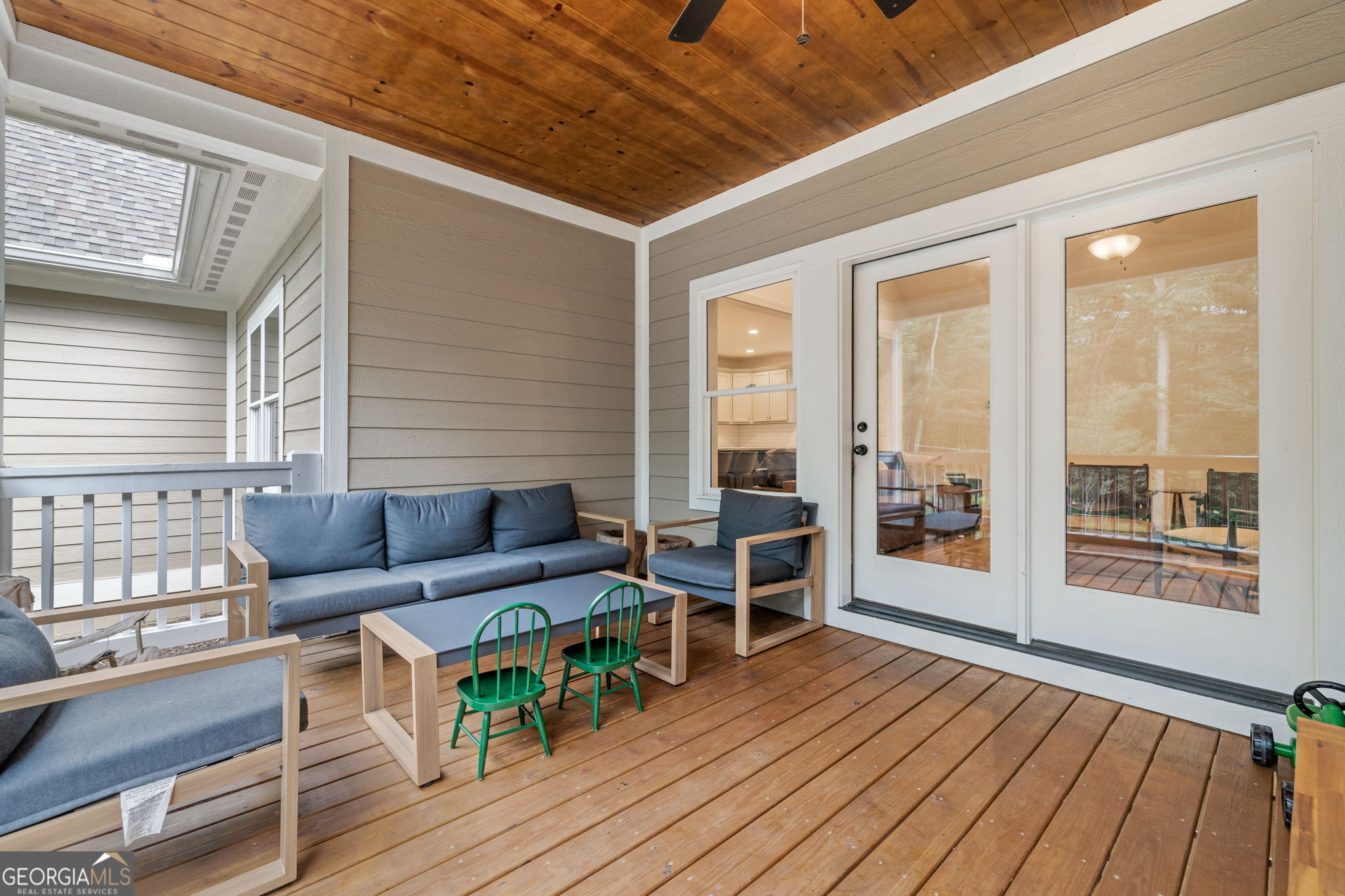 373 McIntosh Road Clarkesville, GA 30523 - Photo 28 of 92 a living room with furniture and a wooden floor