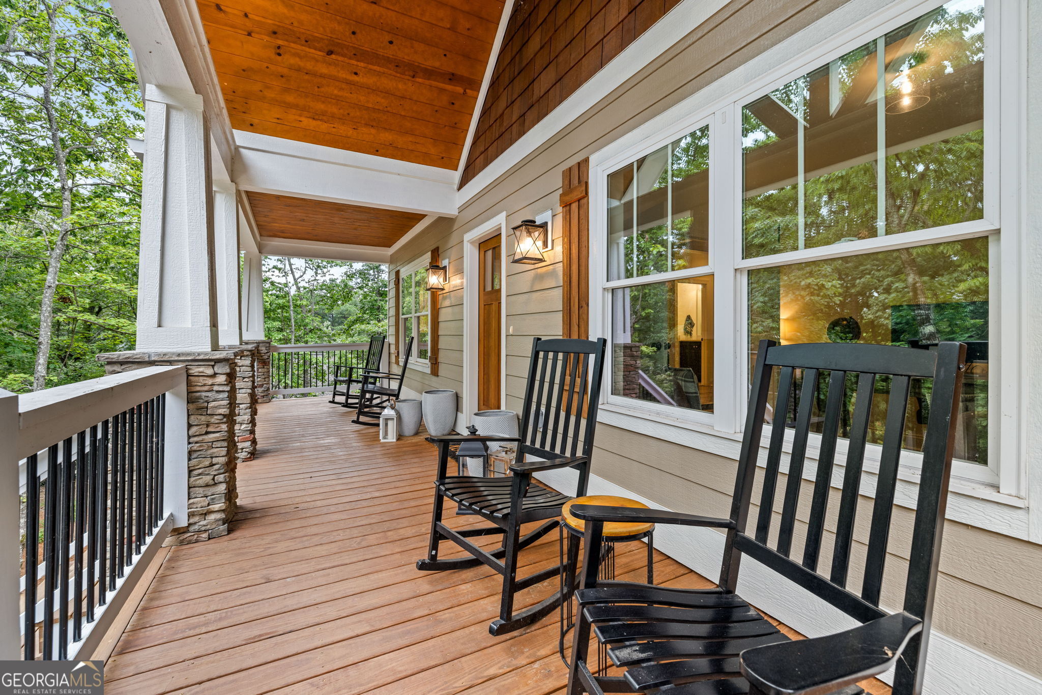 373 McIntosh Road Clarkesville, GA 30523 - Photo 3 of 92 a view of a two chairs in the balcony