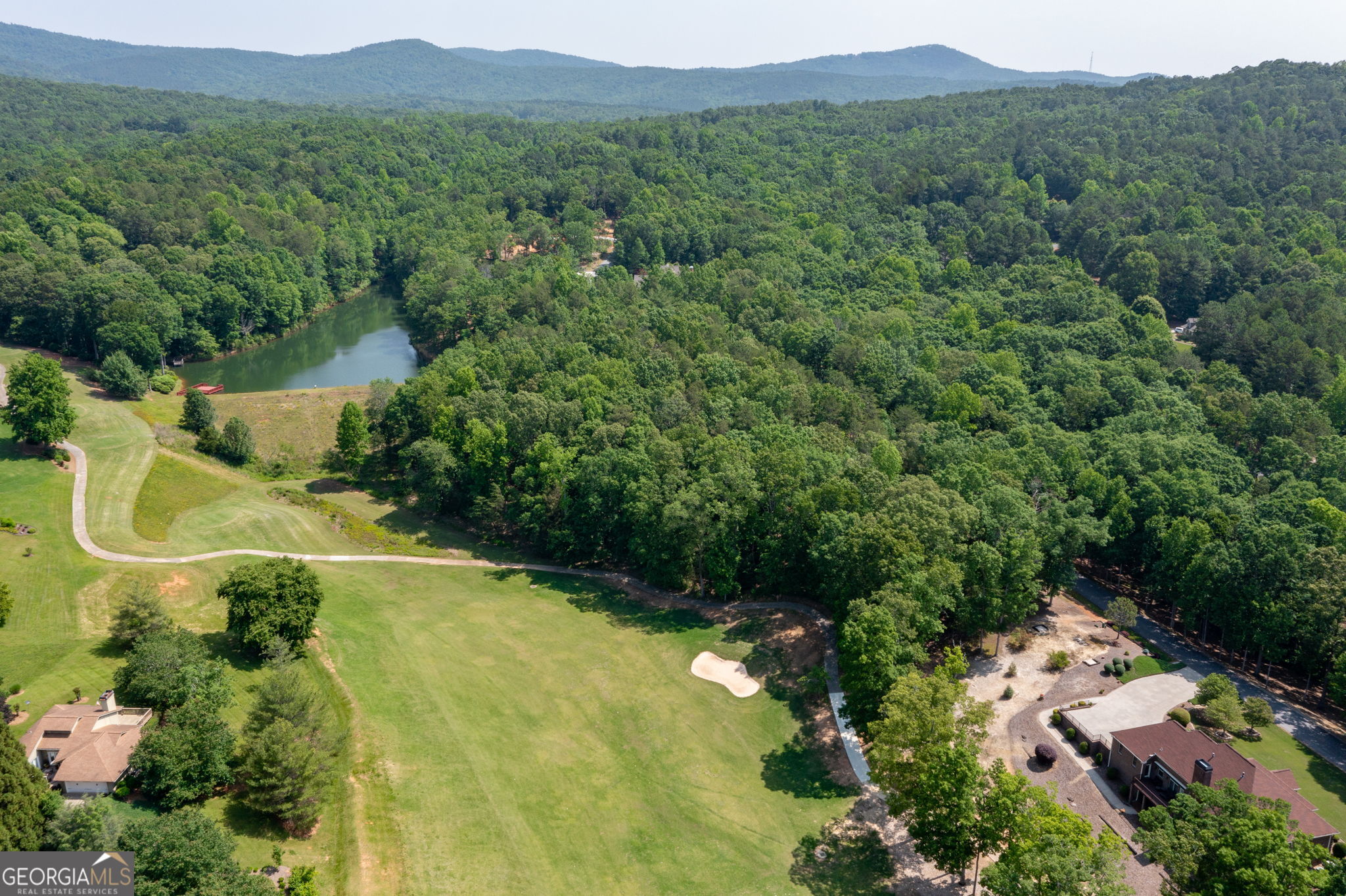 373 McIntosh Road Clarkesville, GA 30523 - Photo 44 of 92 an aerial view of residential house with green space