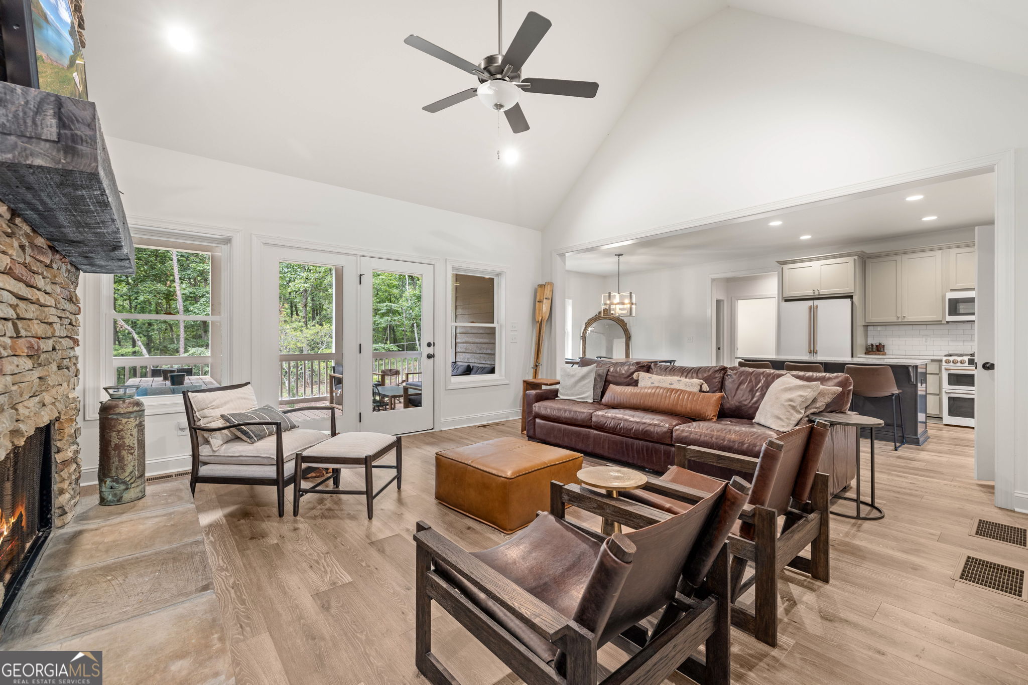 373 McIntosh Road Clarkesville, GA 30523 - Photo 6 of 92 a living room with furniture and a fireplace
