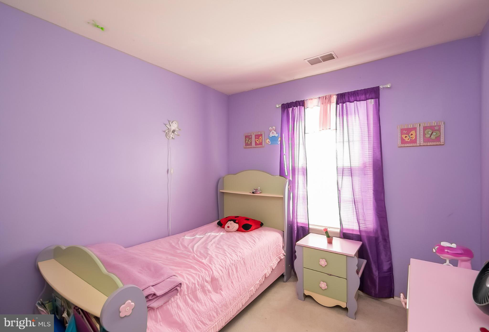 631 Hunting Fields Road Baltimore, MD 21220 - Photo 20 of 29 a bedroom with a bed and a window