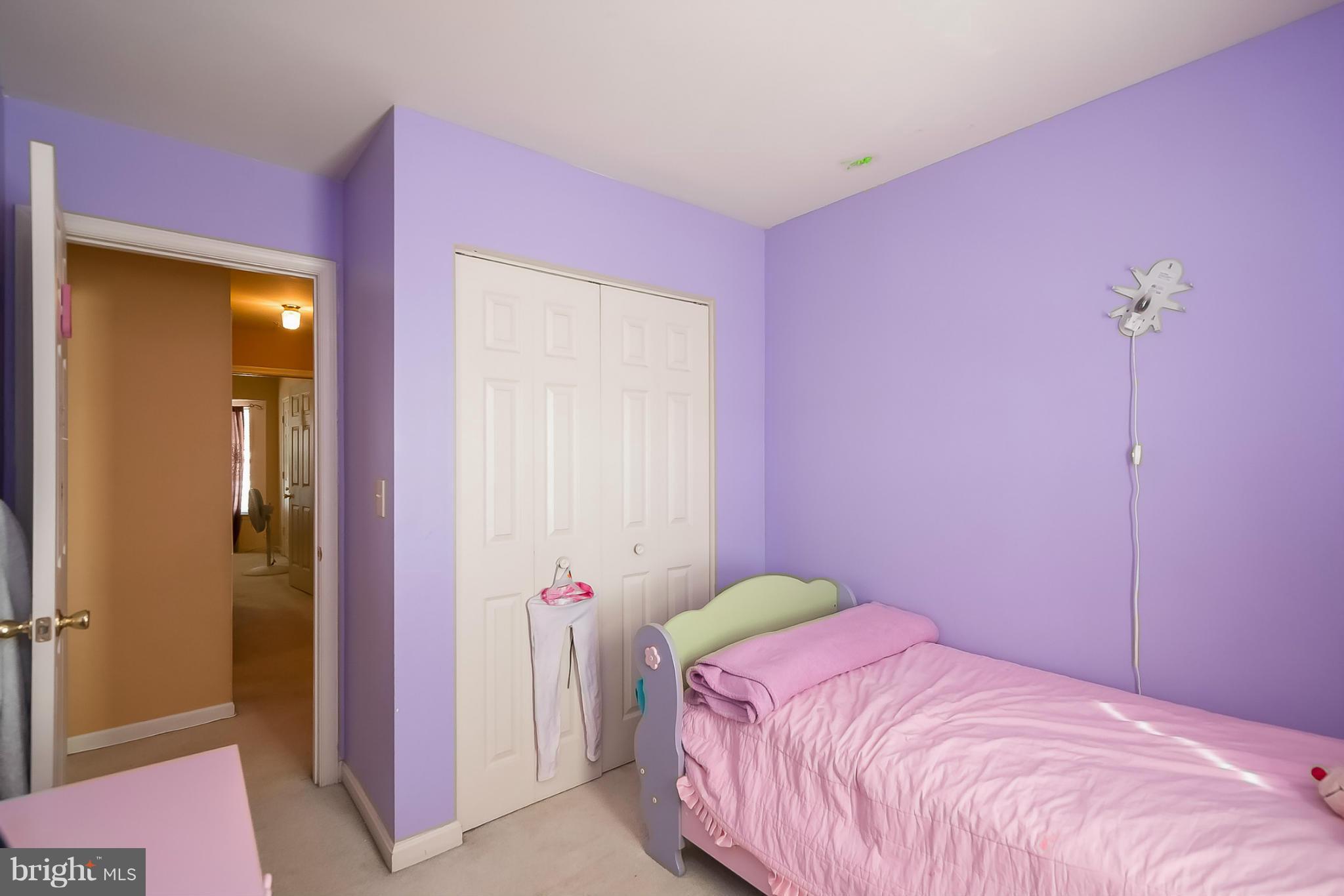 631 Hunting Fields Road Baltimore, MD 21220 - Photo 21 of 29 a bedroom with a bed and a closet