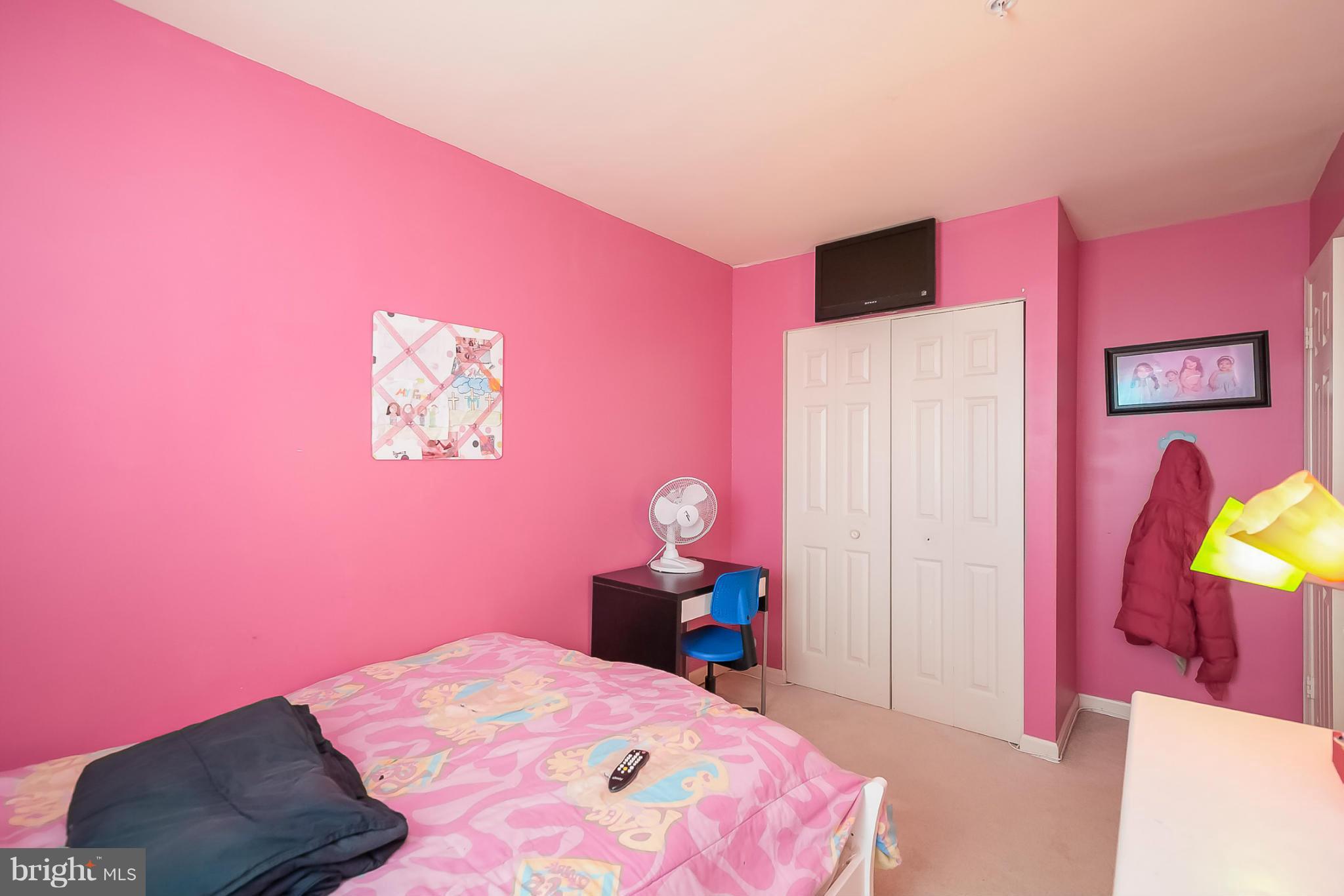 631 Hunting Fields Road Baltimore, MD 21220 - Photo 24 of 29 a bedroom with a bed and a lamp