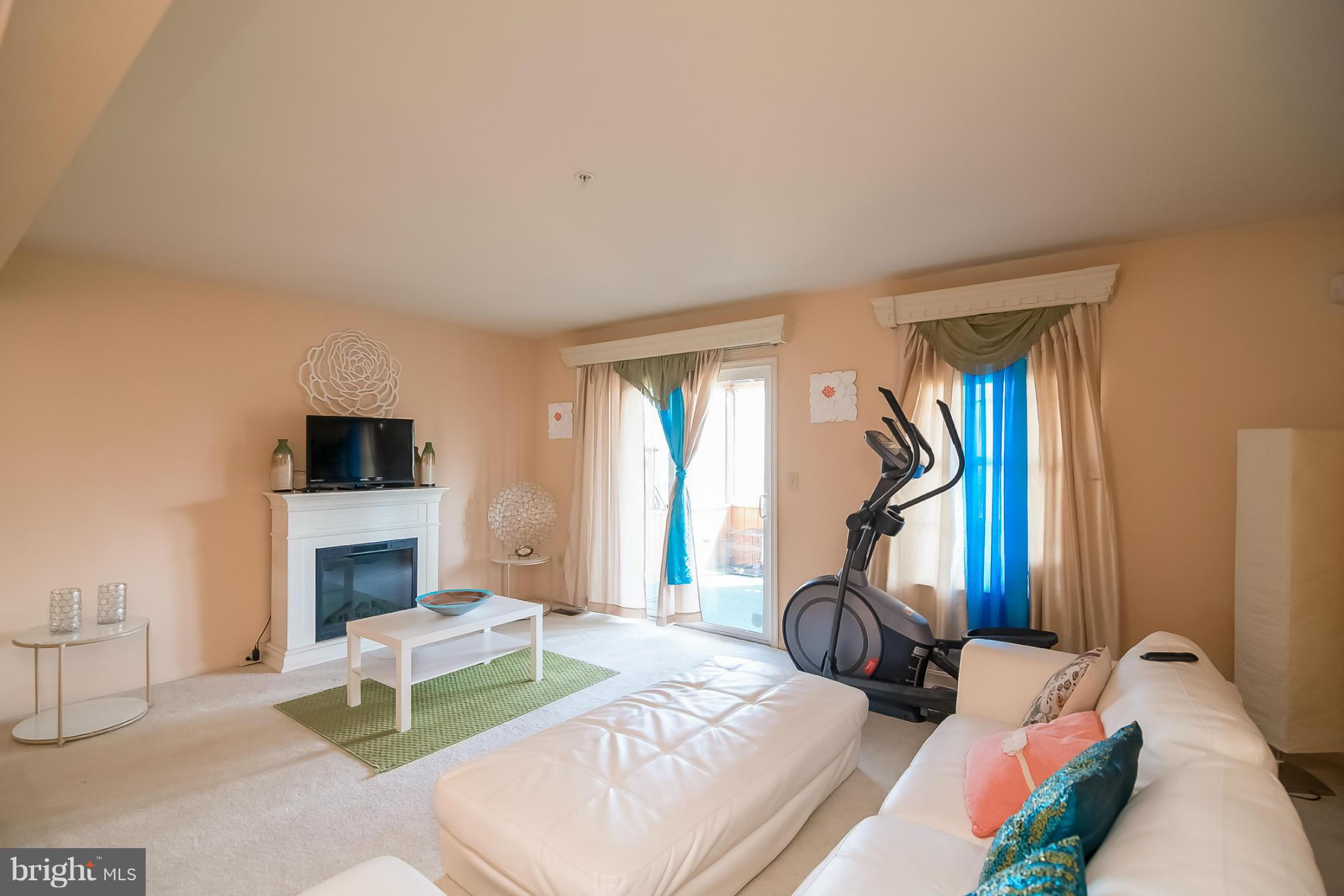 631 Hunting Fields Road Baltimore, MD 21220 - Photo 9 of 29 a bedroom with a bed and a flat screen tv