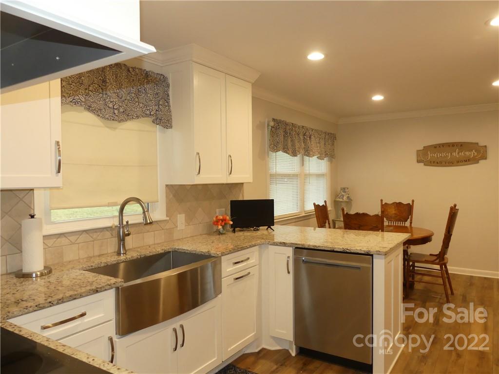 1319 Mooresboro Road Shelby, NC 28150 - Photo 15 of 27 a kitchen filled a sink a counter top space and appliances