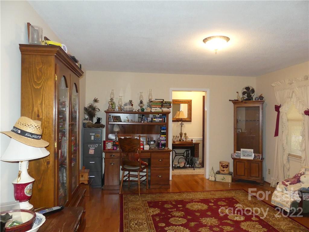 1319 Mooresboro Road Shelby, NC 28150 - Photo 17 of 27 a view of a bedroom with workspace