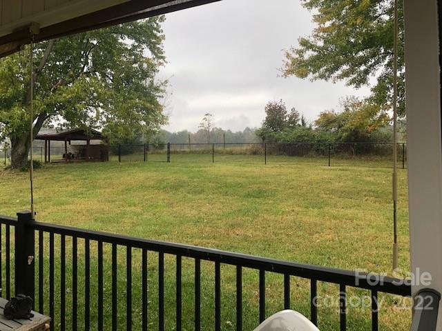 1319 Mooresboro Road Shelby, NC 28150 - Photo 25 of 27 a view of a balcony with an ocean