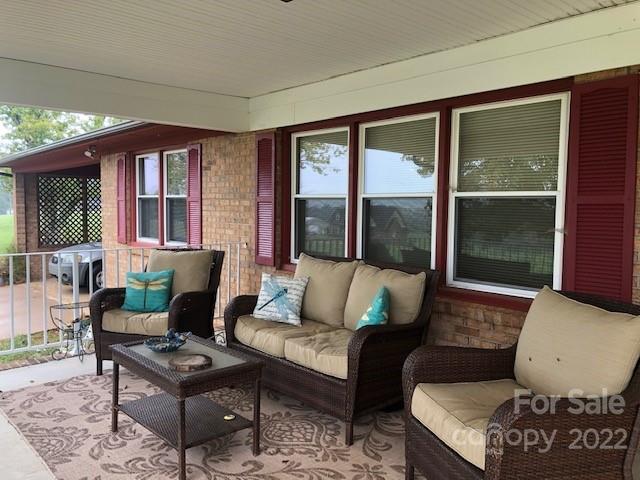 1319 Mooresboro Road Shelby, NC 28150 - Photo 4 of 27 a living room with furniture and a large window