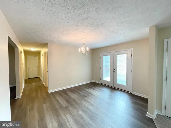 a view of livingroom with hardwood floor and window