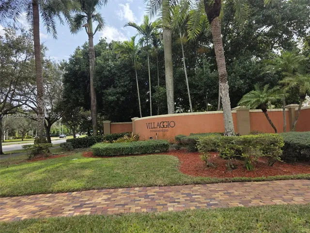 a view of backyard with green space