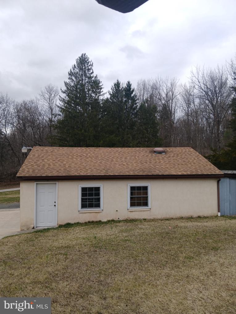 435 Westley Road Mohnton, PA 19540 - Photo 15 of 46 a aerial view of a house with a yard and garage