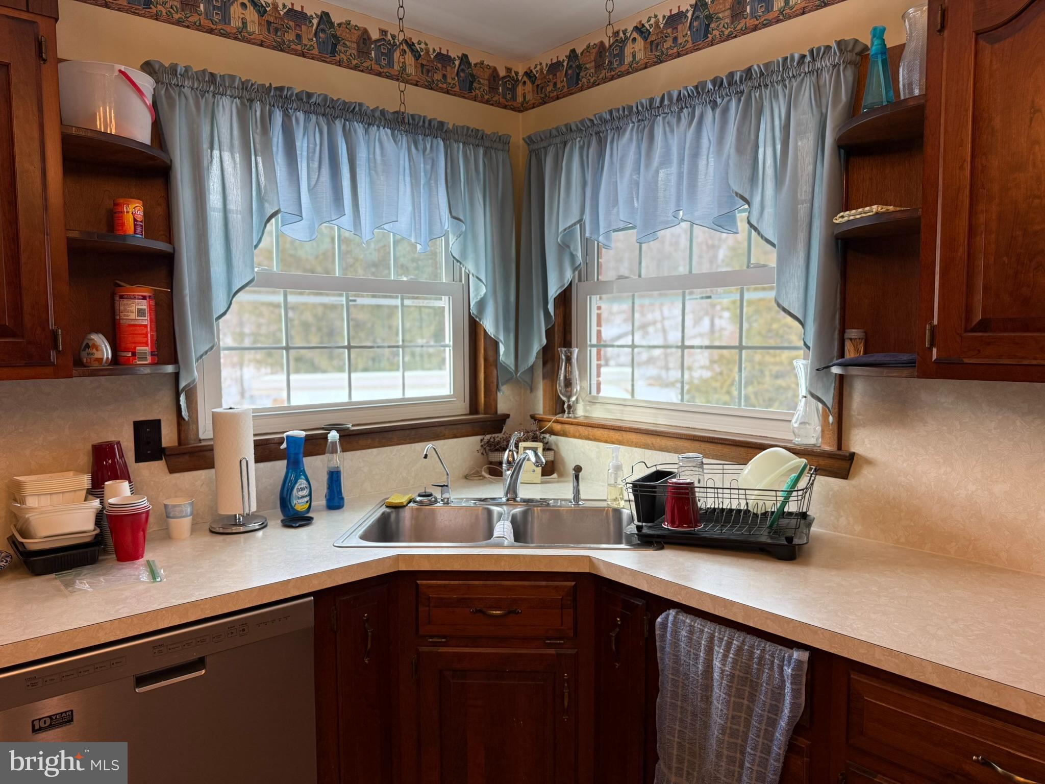 435 Westley Road Mohnton, PA 19540 - Photo 18 of 43 a kitchen with stainless steel appliances a sink a counter space and a window