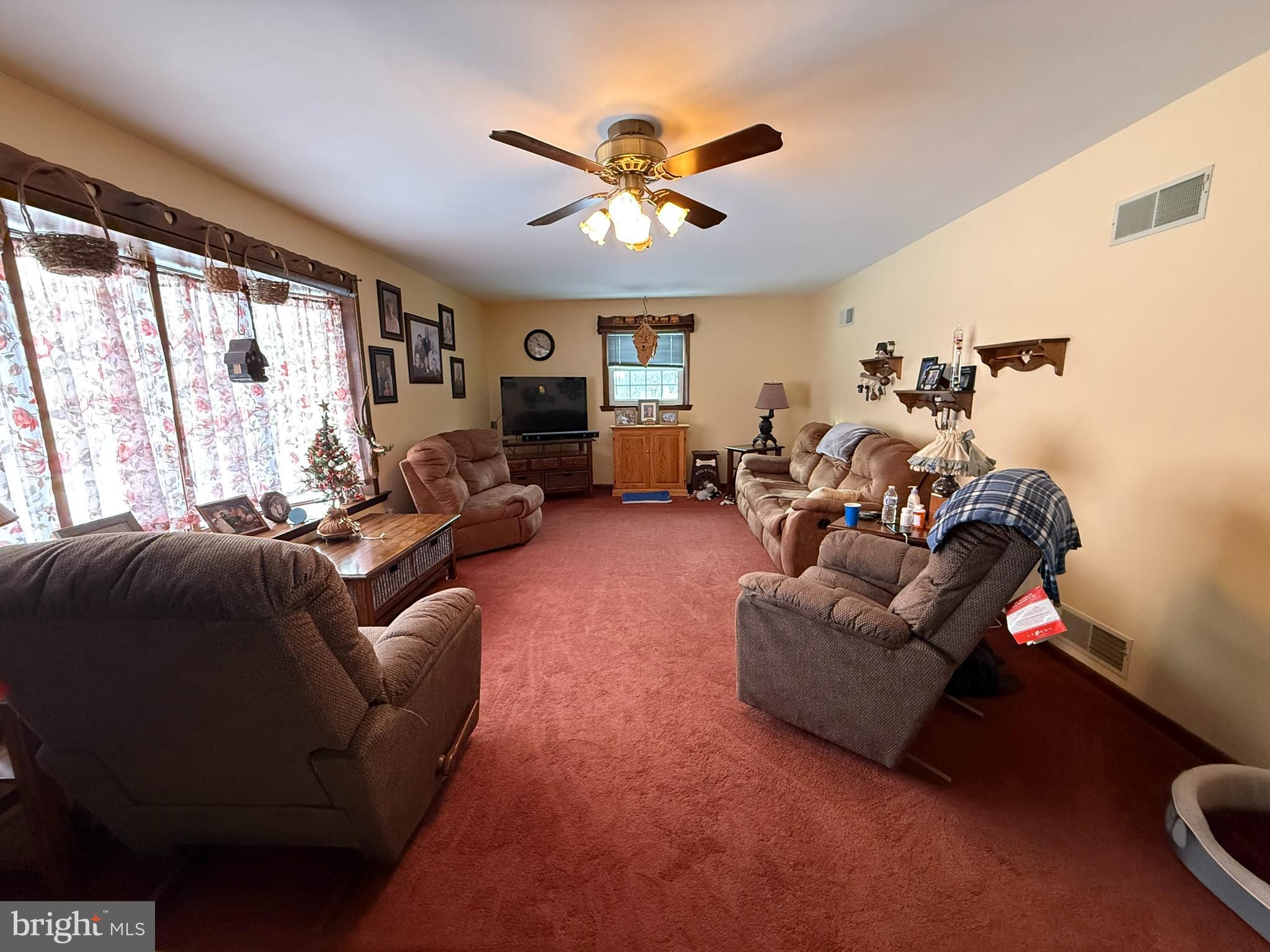 435 Westley Road Mohnton, PA 19540 - Photo 19 of 43 a living room with furniture and a large window