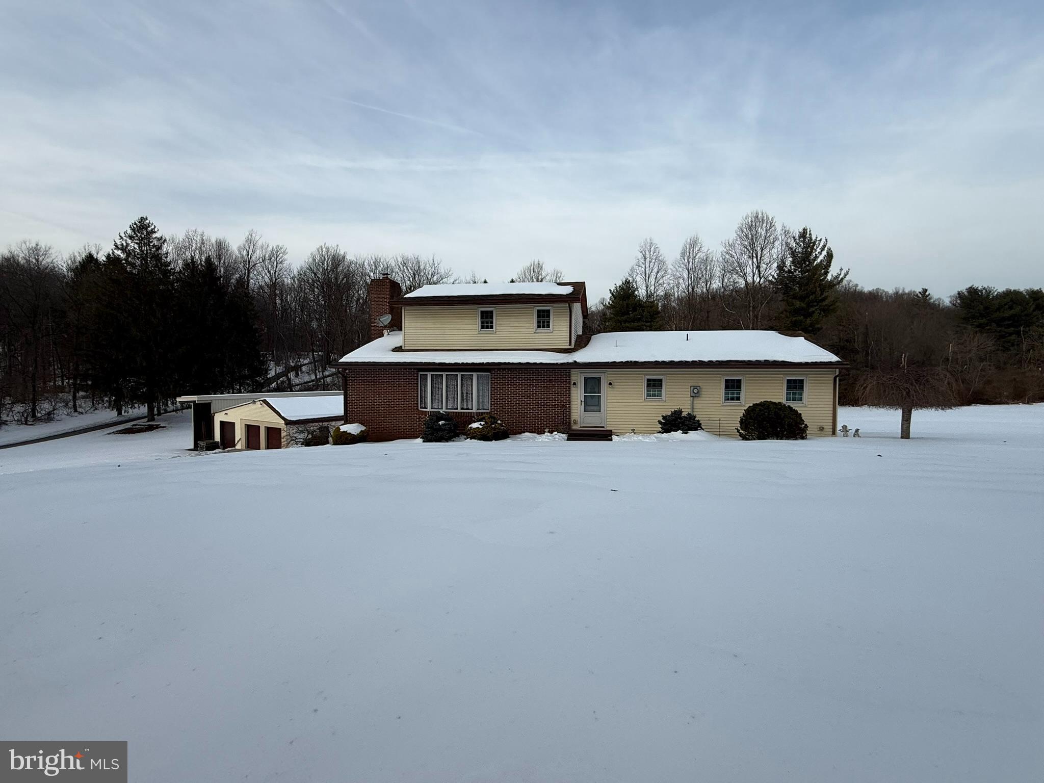 435 Westley Road Mohnton, PA 19540 - Photo 2 of 46 a view of a big house with a big yard and large trees