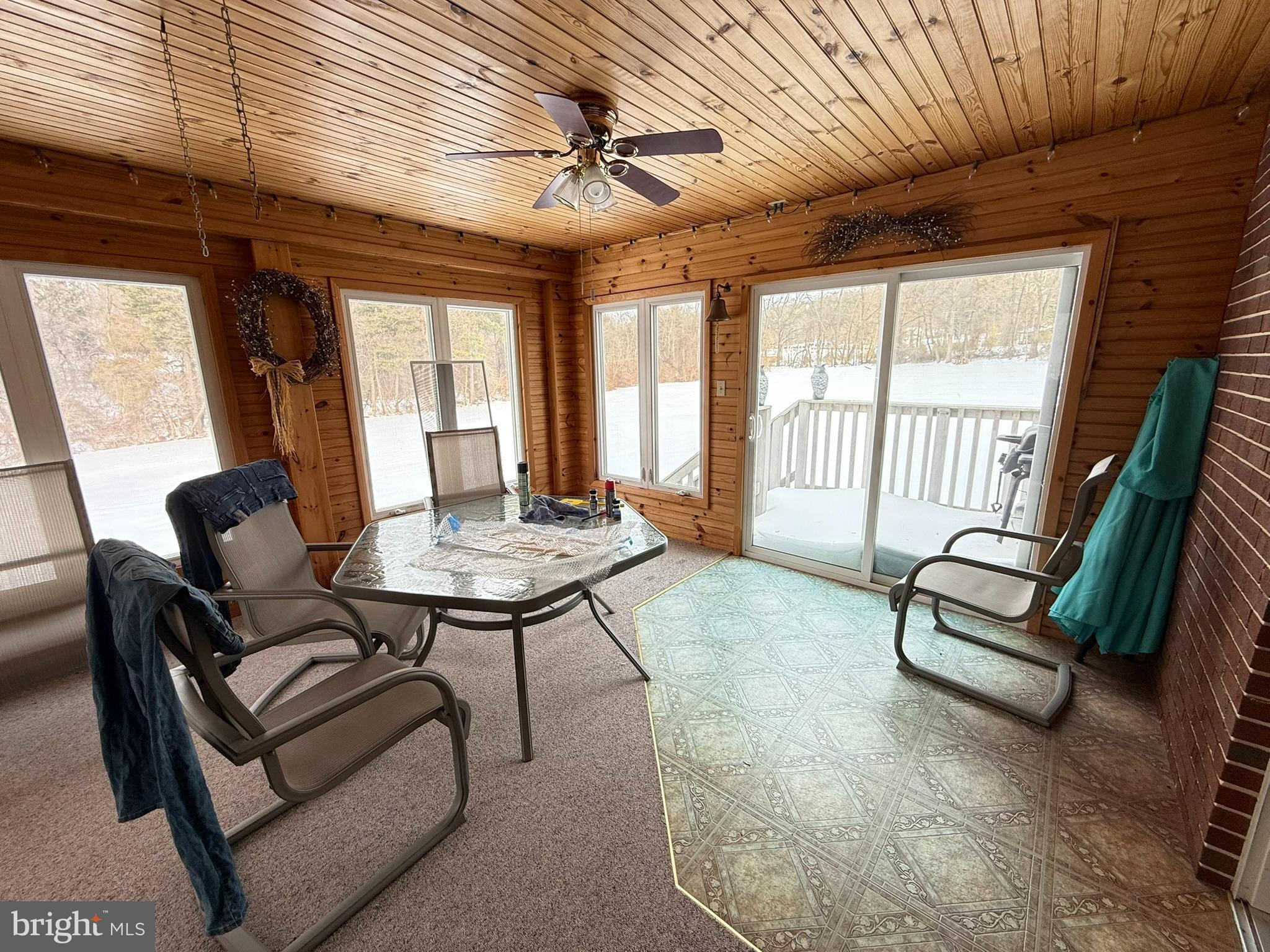 435 Westley Road Mohnton, PA 19540 - Photo 23 of 43 a living room with furniture a flat screen tv and a large window