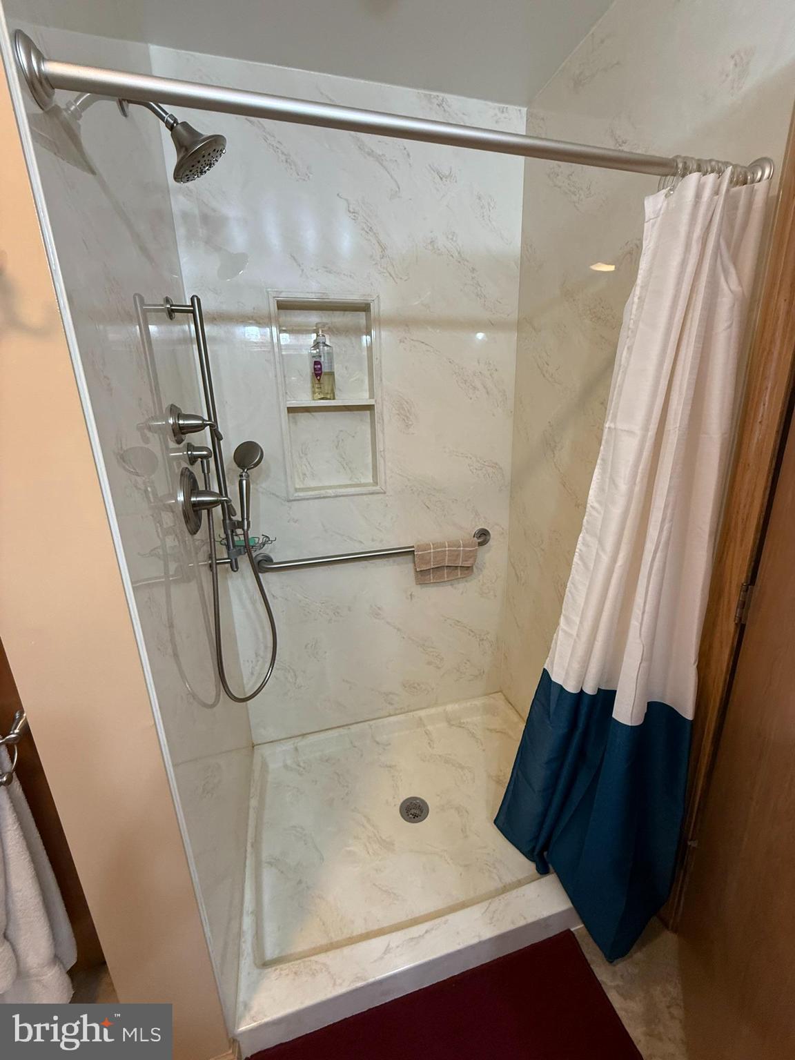 435 Westley Road Mohnton, PA 19540 - Photo 28 of 43 a bathroom with a shower and a glass door