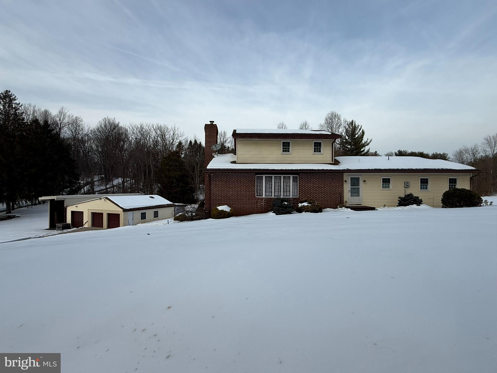435 Westley Road Mohnton, PA 19540 - Photo 3 of 46 a view of a house with a yard and sitting area