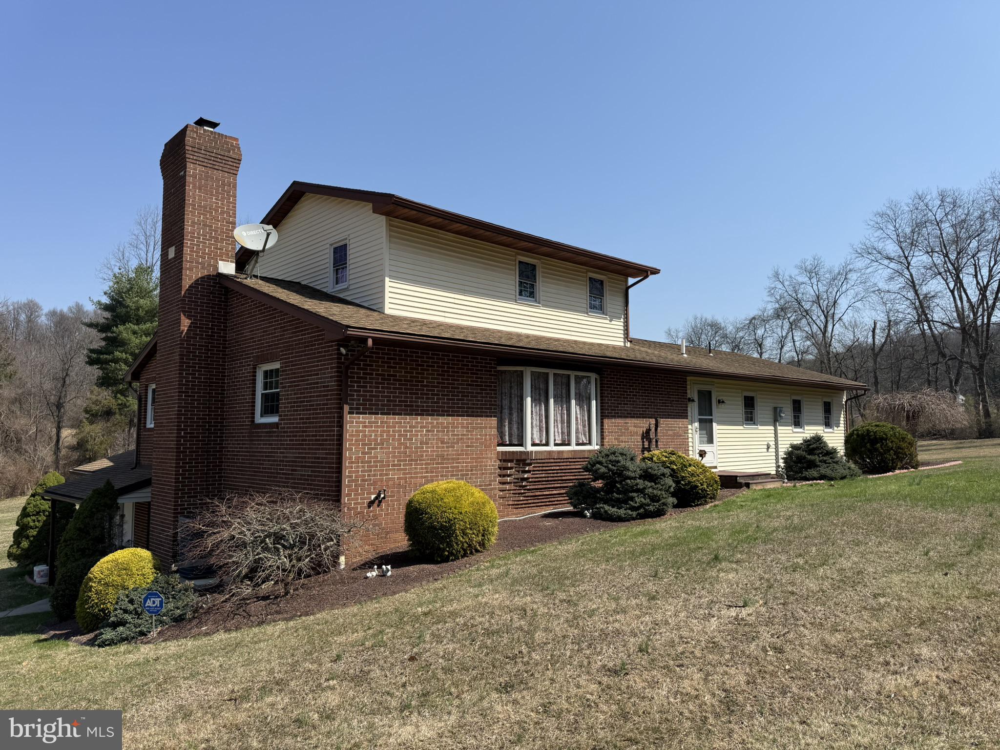 435 Westley Road Mohnton, PA 19540 - Photo 3 of 43 a front view of a house with garden