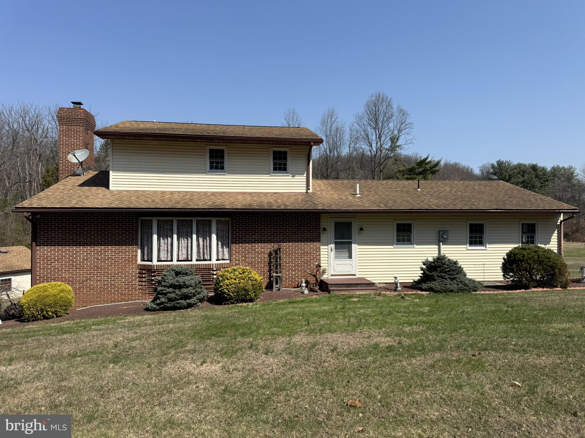 435 Westley Road Mohnton, PA 19540 - Photo 4 of 43 a front view of a house with a yard