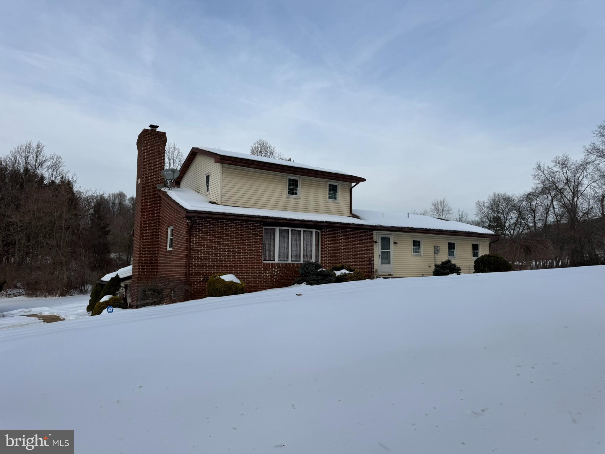435 Westley Road Mohnton, PA 19540 - Photo 5 of 46 a view of a house with a yard and roof