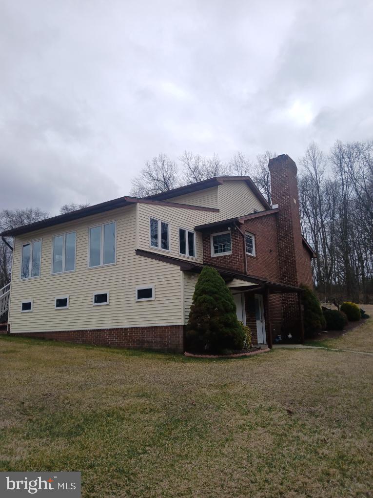 435 Westley Road Mohnton, PA 19540 - Photo 9 of 46 a front view of a house with garden