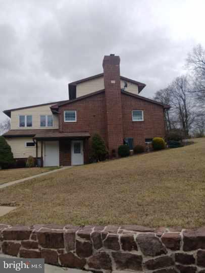 435 Westley Road Mohnton, PA 19540 - Photo 10 of 46 a front view of a house with a yard