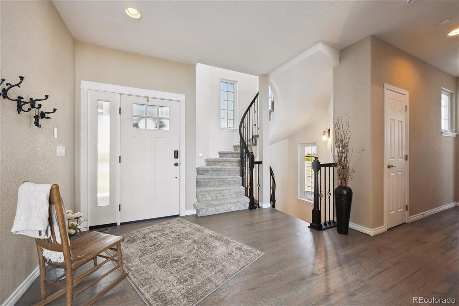 724 Imboden Road Watkins, CO 80137 - Photo 3 of 50 a view of entryway with livingroom