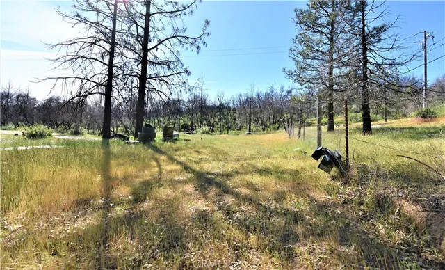a view of a lake with a building in the background
