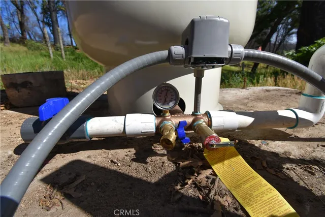 a view of a yard with trees