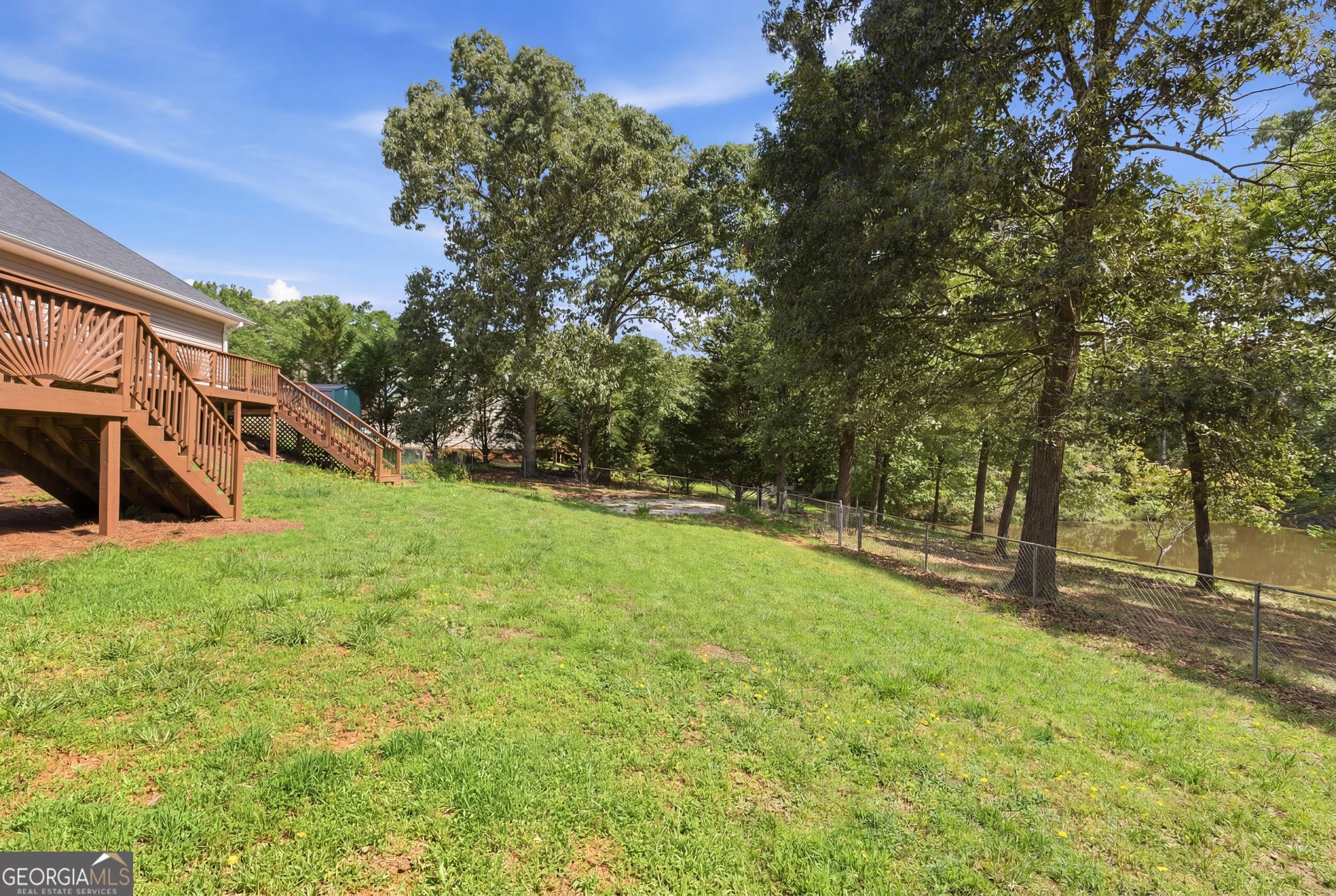 171 Winding Way Hartwell, GA 30643 - Photo 29 of 37 a view of a backyard with large trees