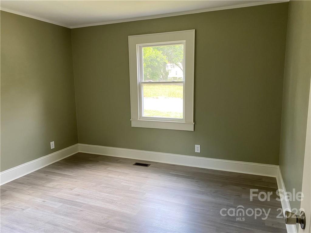 706 Kings Road Shelby, NC 28150 - Photo 15 of 25 an empty room with a window