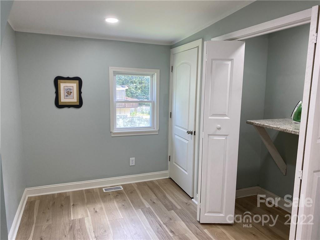 706 Kings Road Shelby, NC 28150 - Photo 17 of 25 an empty room with windows and closet