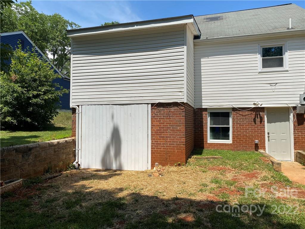 706 Kings Road Shelby, NC 28150 - Photo 22 of 25 a view of a house with a yard