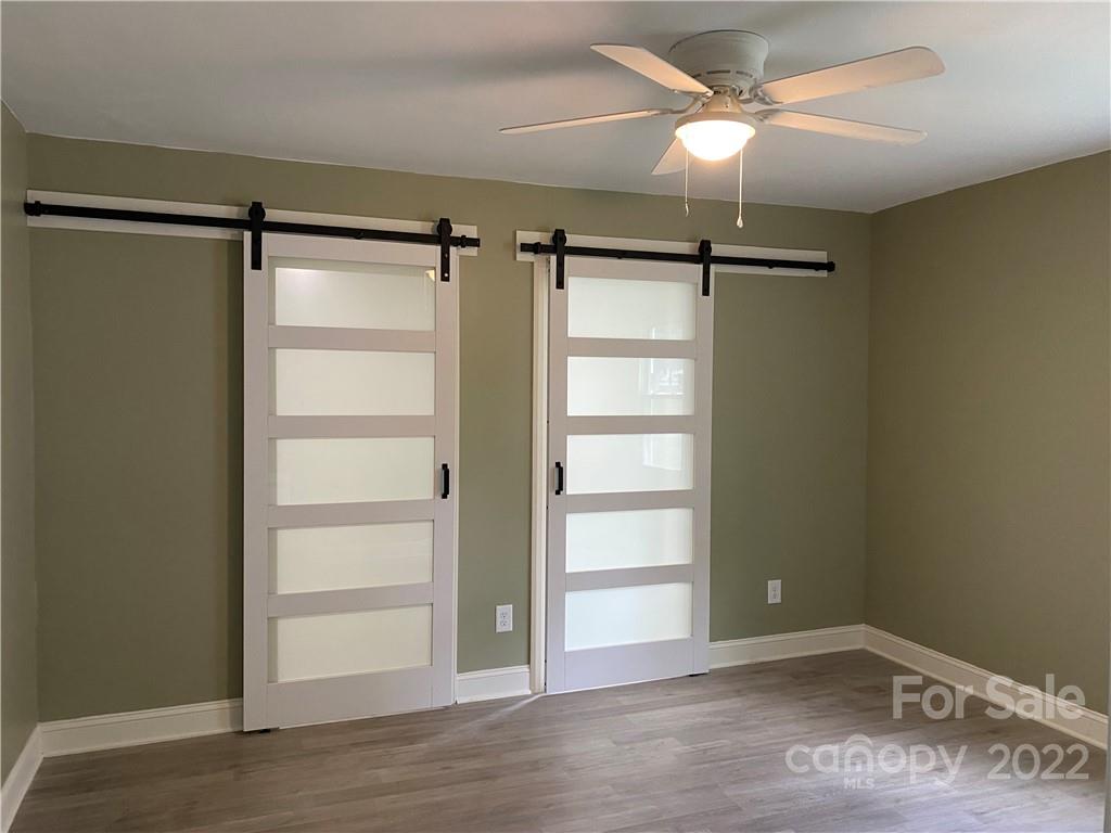706 Kings Road Shelby, NC 28150 - Photo 8 of 25 a view of an empty room with a window